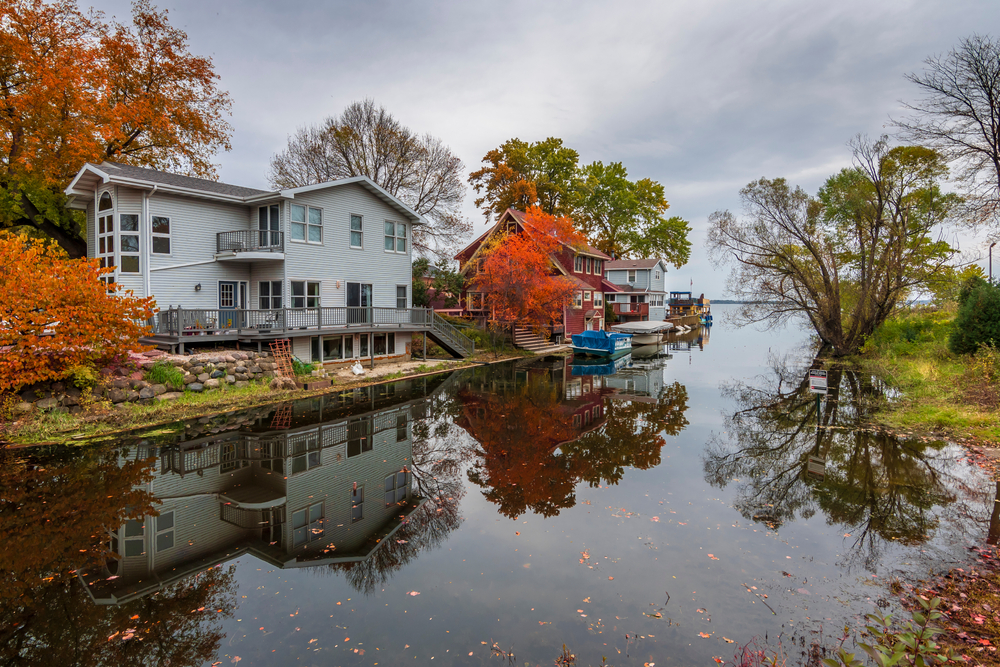 beautiful waterfront home, autumn leaves