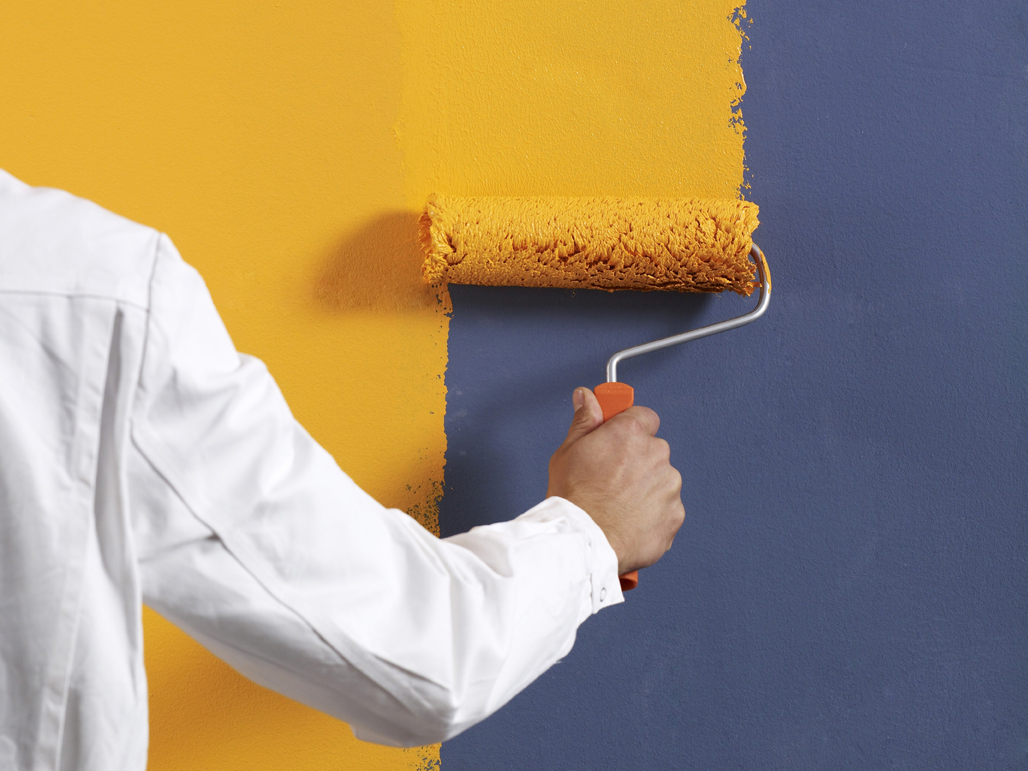 person painting wall, renter, new paint color
